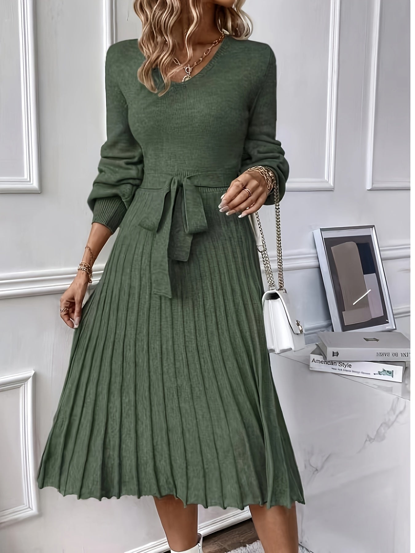 Lantern sleeve pleated hem and belted sweater dress